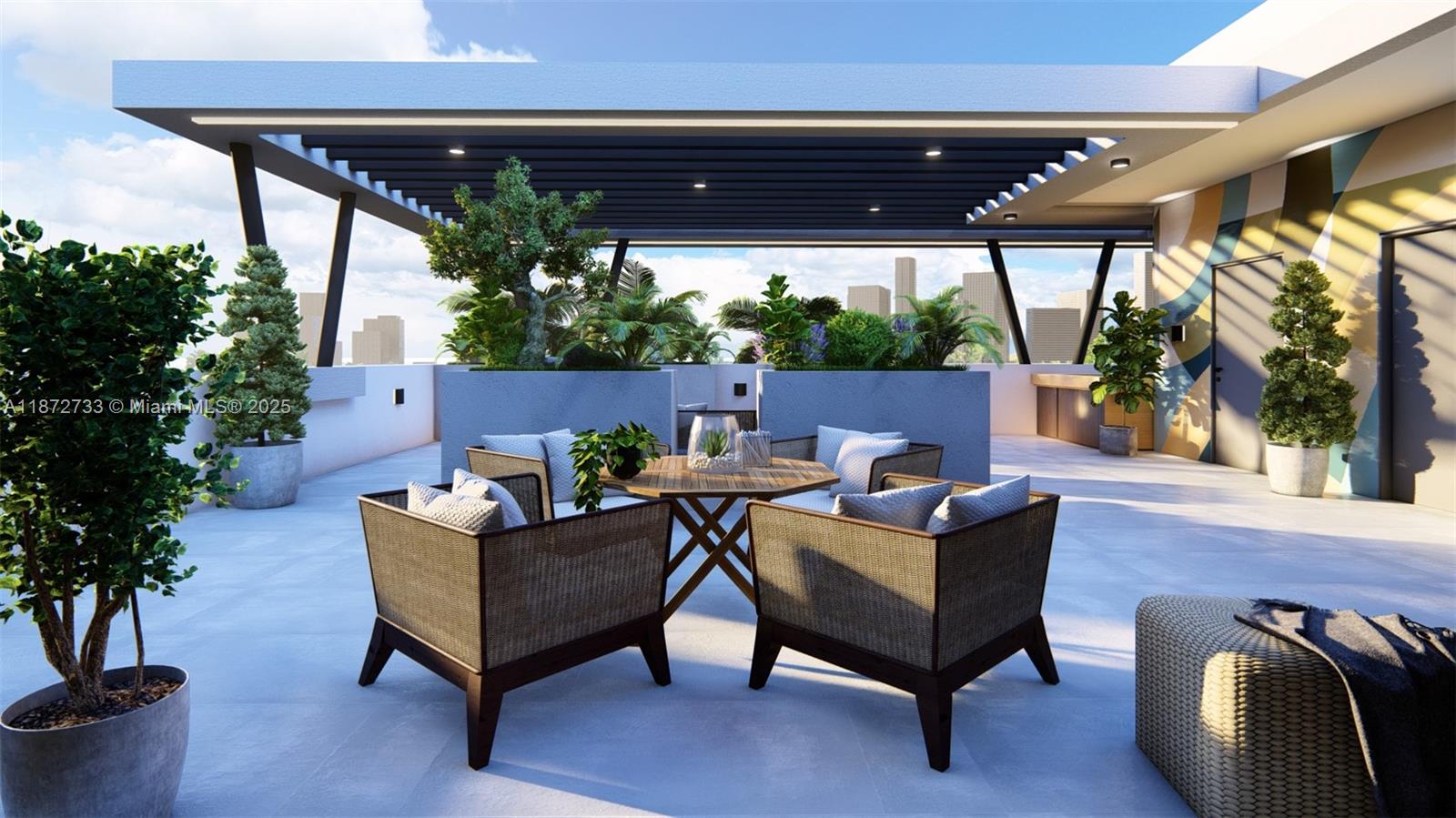591 Northwest 34th Street Miami, FL 33127 - Photo 13 of 14 a outdoor living space with furniture and a potted plant