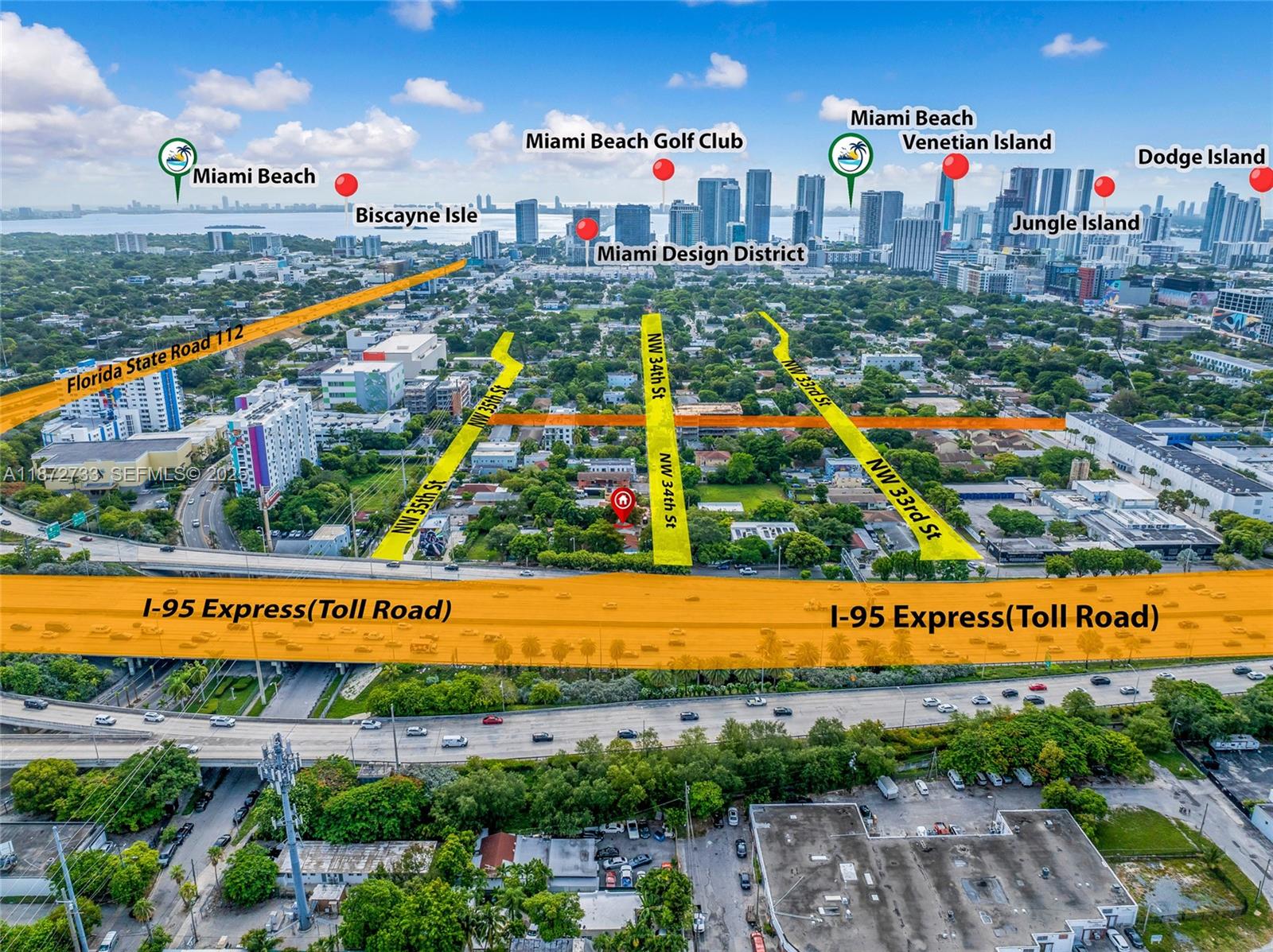 591 Northwest 34th Street Miami, FL 33127 - Photo 2 of 14 a view of a city