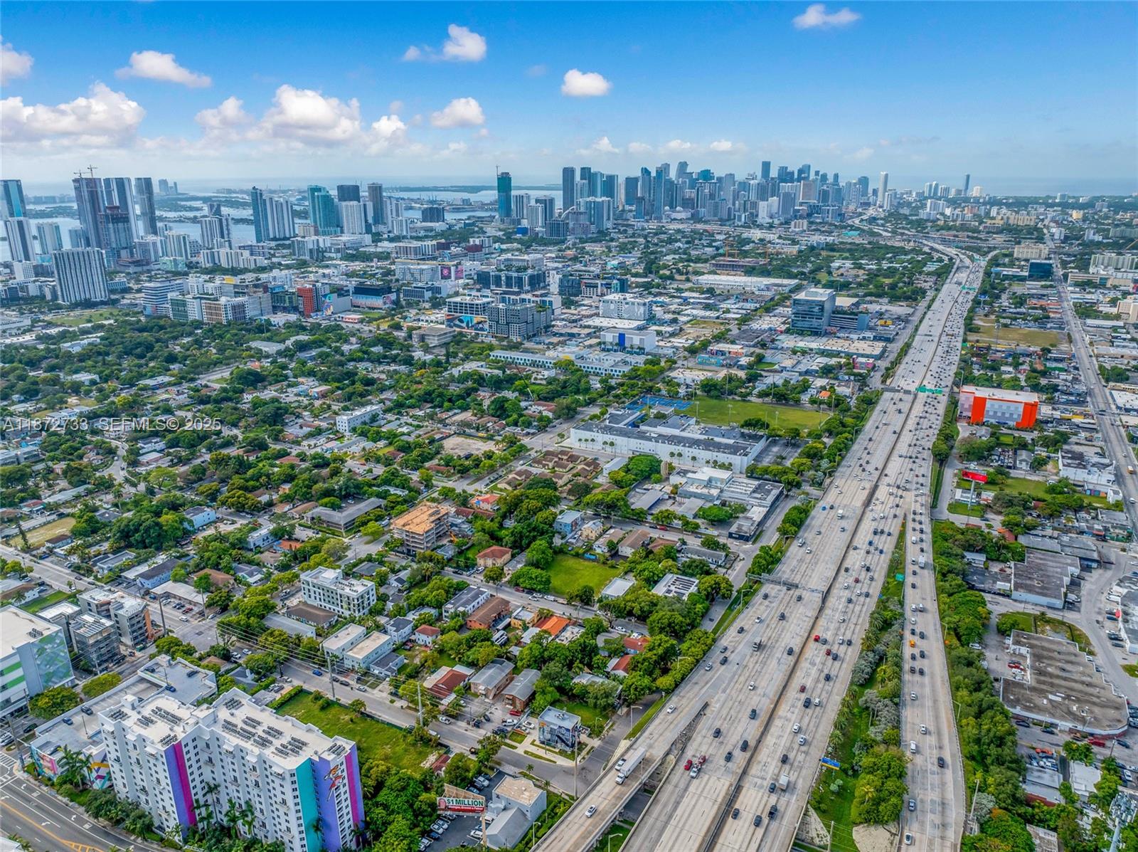 591 Northwest 34th Street Miami, FL 33127 - Photo 6 of 14 a view of a city