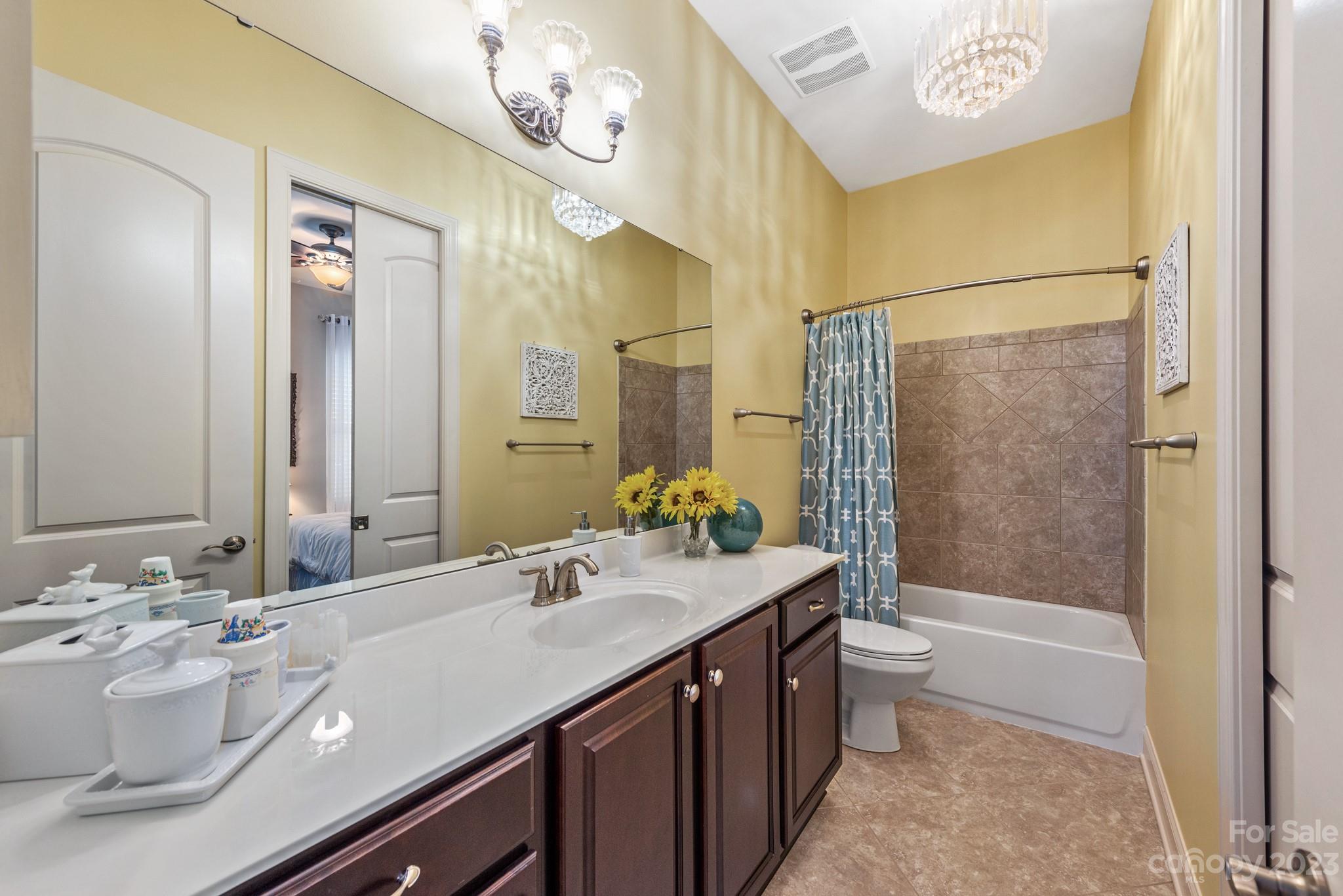 9006 Blue Ridge Drive Indian Land, SC 29707 - Photo 20 of 27 a bathroom with a double vanity sink mirror double and bathtub