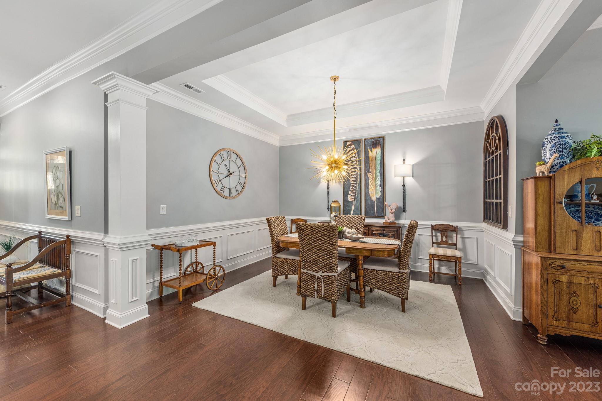 9006 Blue Ridge Drive Indian Land, SC 29707 - Photo 4 of 27 a view of a dining room with furniture window and wooden floor