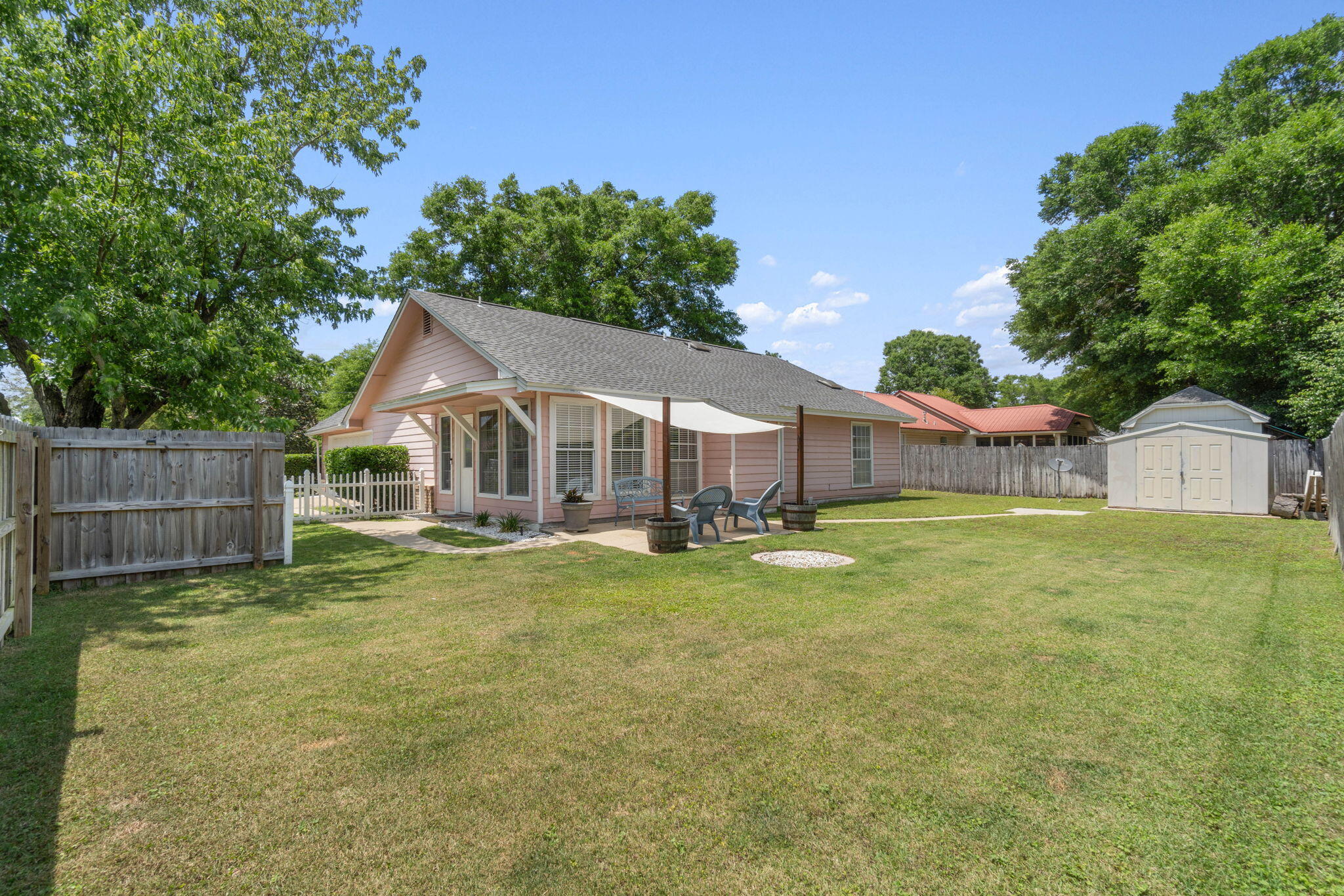 40 Abbey Road Crestview, FL 32539 - Photo 33 of 37 a view of a house with a yard
