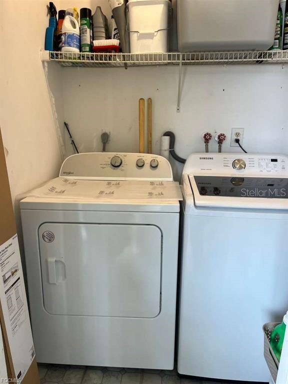 22278 Vick Street, Unit A112 Punta Gorda, FL 33980 - Photo 12 of 33 a utility room with dryer and washer