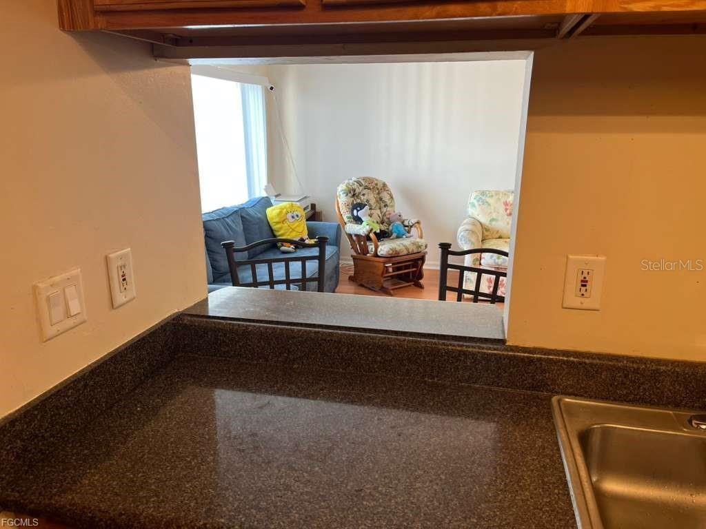 22278 Vick Street, Unit A112 Punta Gorda, FL 33980 - Photo 16 of 33 a view of a living room and dining room