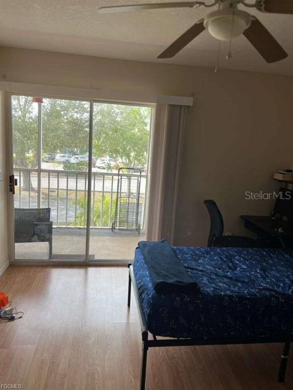 22278 Vick Street, Unit A112 Punta Gorda, FL 33980 - Photo 25 of 33 a living room with a large window