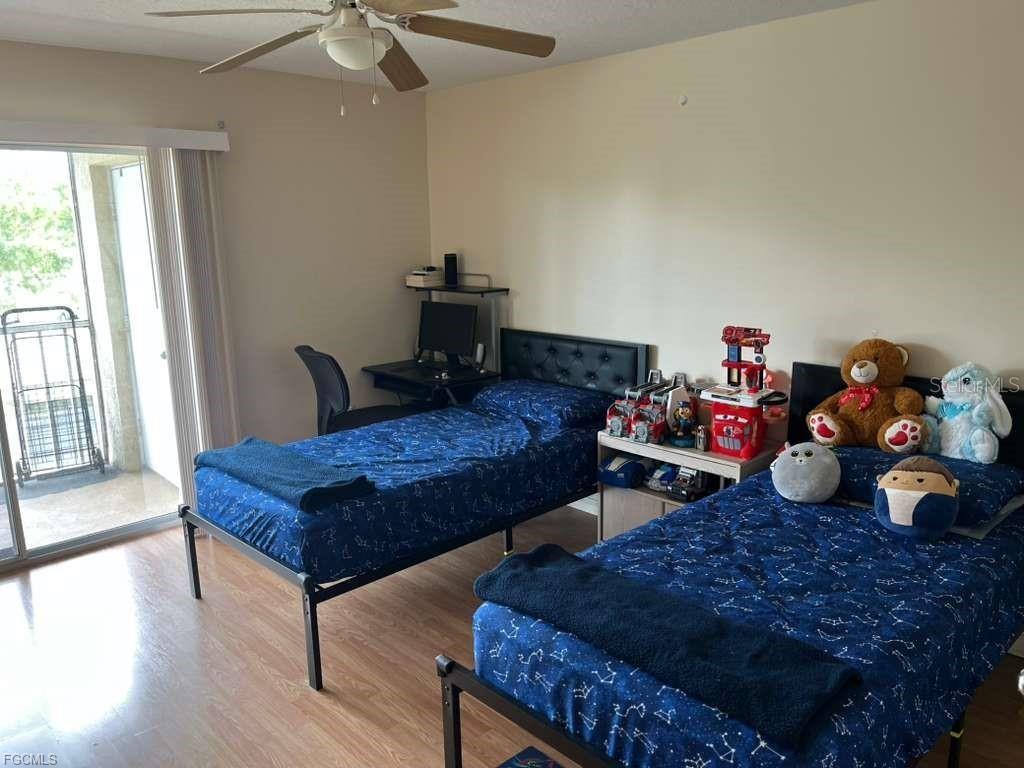 22278 Vick Street, Unit A112 Punta Gorda, FL 33980 - Photo 28 of 33 a living room with furniture and a wooden floor