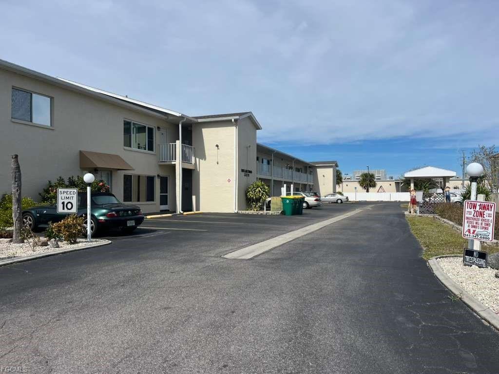 22278 Vick Street, Unit A112 Punta Gorda, FL 33980 - Photo 31 of 33 a view of a street with cars