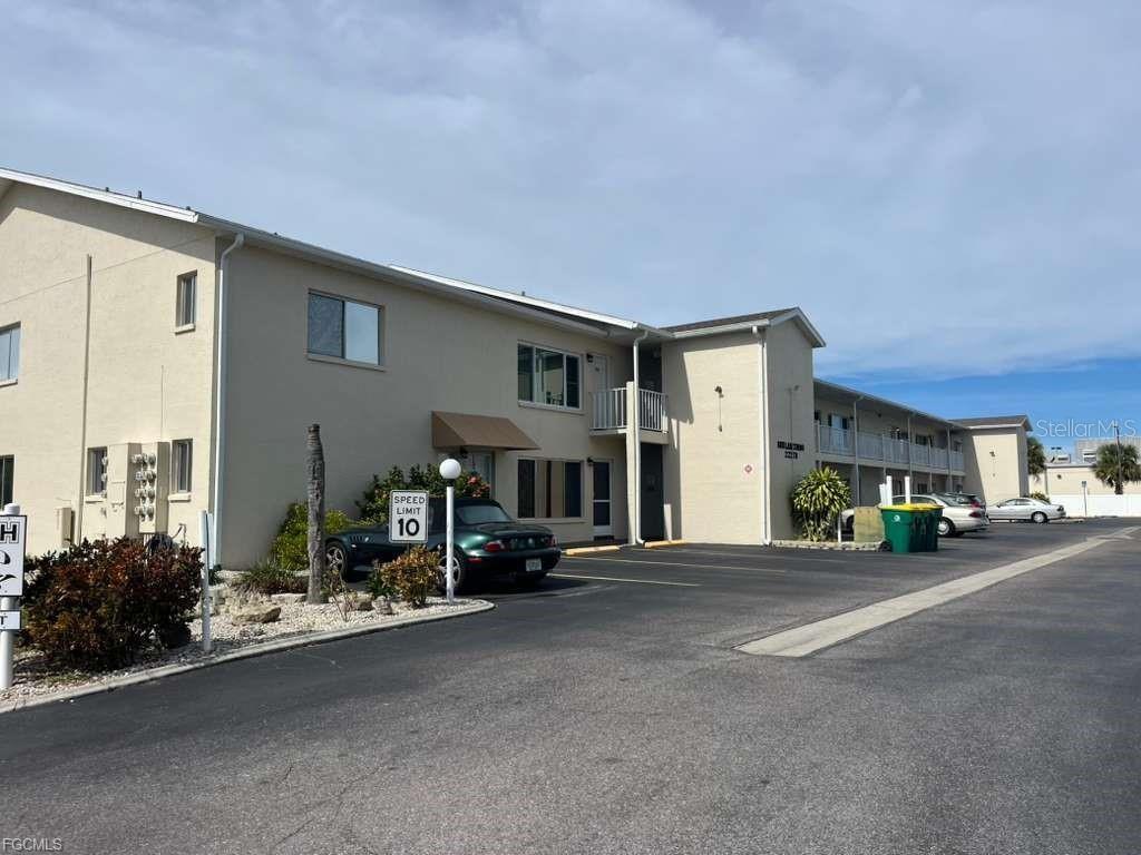 22278 Vick Street, Unit A112 Punta Gorda, FL 33980 - Photo 33 of 33 a view of a street with cars