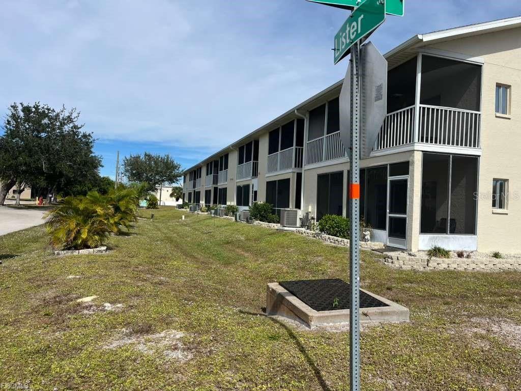 22278 Vick Street, Unit A112 Punta Gorda, FL 33980 - Photo 4 of 33 a front view of a house with garden
