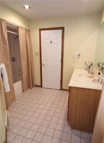 4568 Battle Ridge Road Oakdale, PA 15071 - Photo 14 of 24 Ensuite bathroom with large vanity & tile flooring