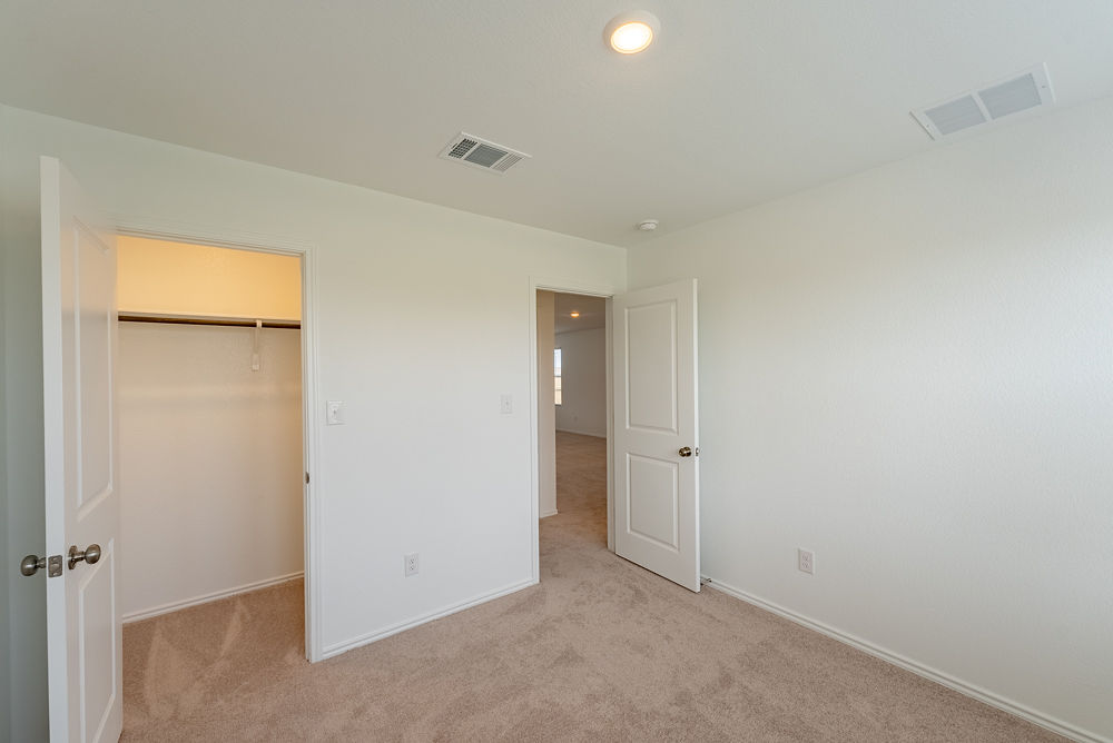 126 Avre Loop Kyle, TX 78640 - Photo 13 of 19 a view of an empty room