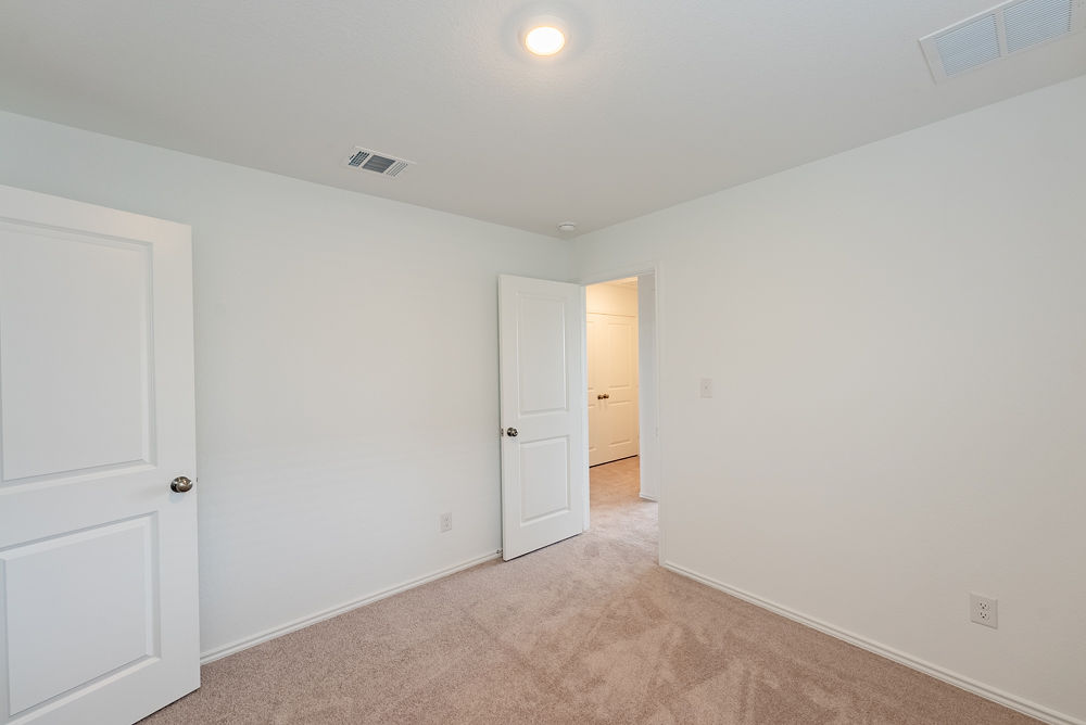 126 Avre Loop Kyle, TX 78640 - Photo 15 of 19 a view of an empty room