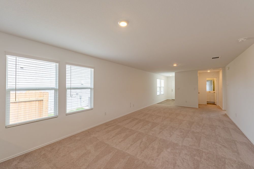 126 Avre Loop Kyle, TX 78640 - Photo 4 of 19 a view of an empty room with a window