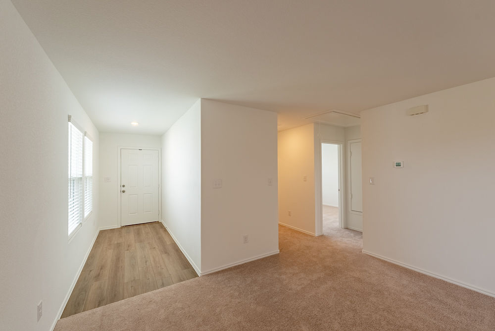 126 Avre Loop Kyle, TX 78640 - Photo 6 of 20 a view of an empty room and window