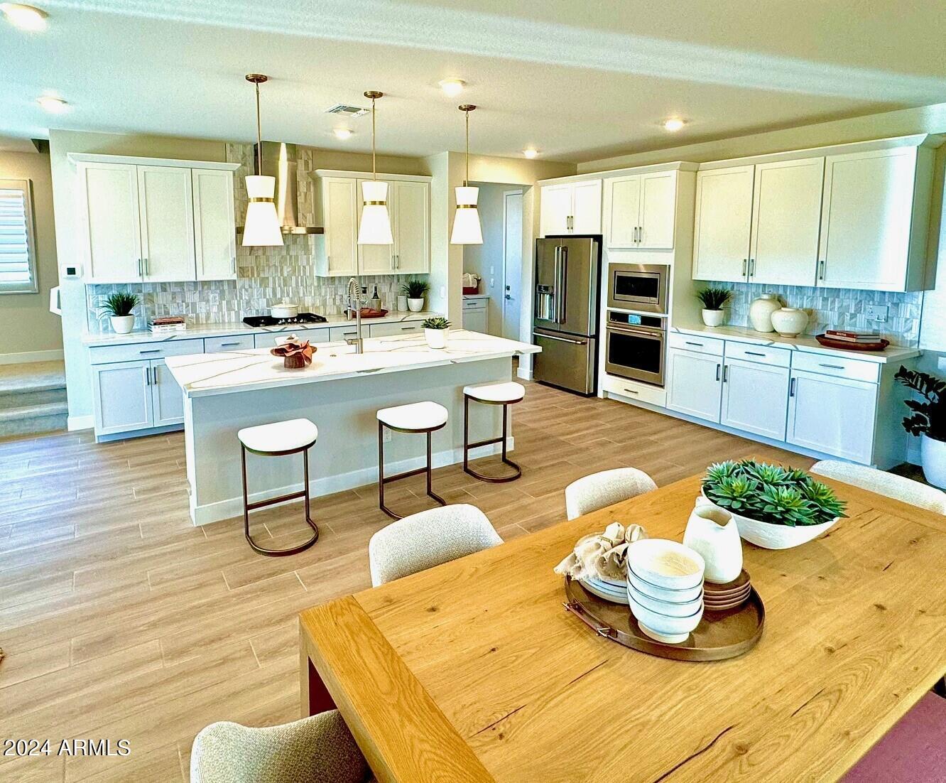 2430 West Rowel Road Phoenix, AZ 85085 - Photo 4 of 15 Plan 3 Model Elite Kitchen from dIning