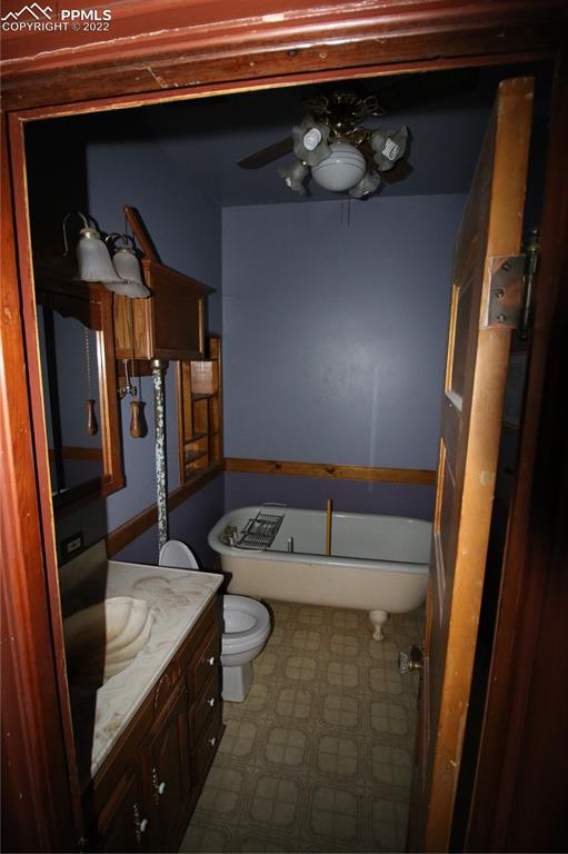 604 South Main Street Fowler, CO 81039 - Photo 18 of 50 a bathroom with a sink and a mirror