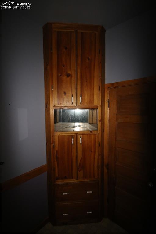 604 South Main Street Fowler, CO 81039 - Photo 20 of 50 a room with storage and utility