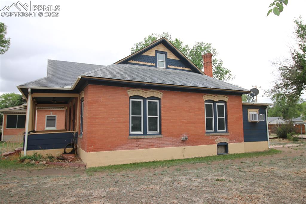 604 South Main Street Fowler, CO 81039 - Photo 34 of 50 a front view of a house with a garden