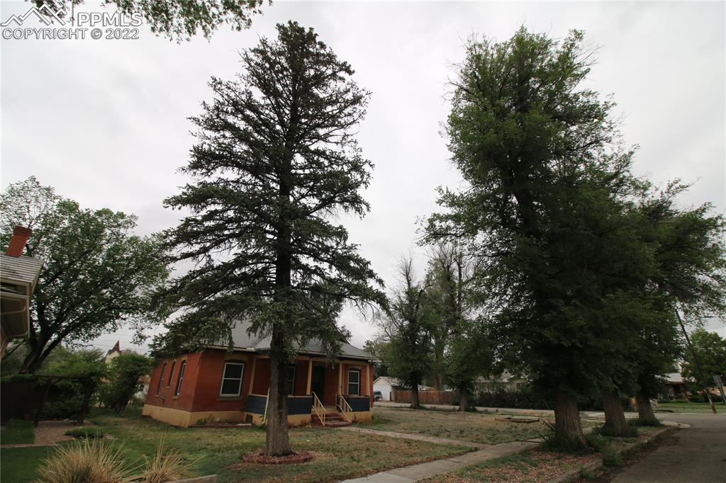 604 South Main Street Fowler, CO 81039 - Photo 38 of 50 a front view of a house with a tree