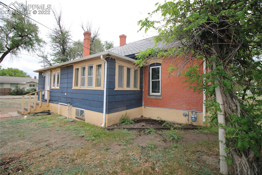 604 South Main Street Fowler, CO 81039 - Photo 43 of 50 a front view of a house with a yard