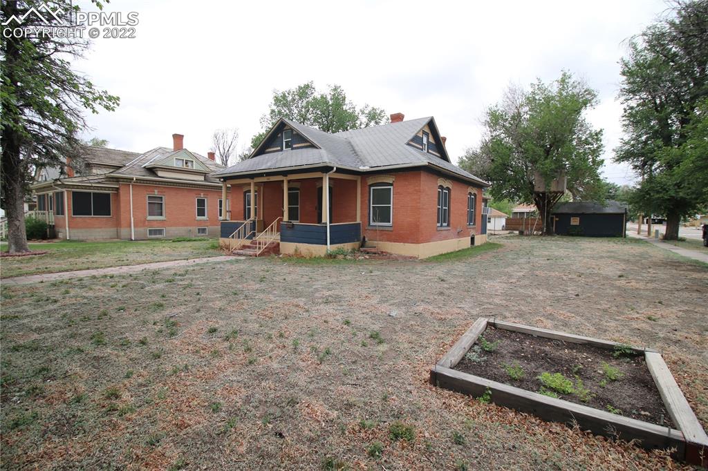 604 South Main Street Fowler, CO 81039 - Photo 46 of 50 a view of a house with a yard