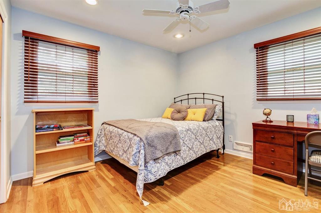 6 Huntington Road Edison, NJ 08820 - Photo 18 of 23 a bedroom with a bed and a dresser