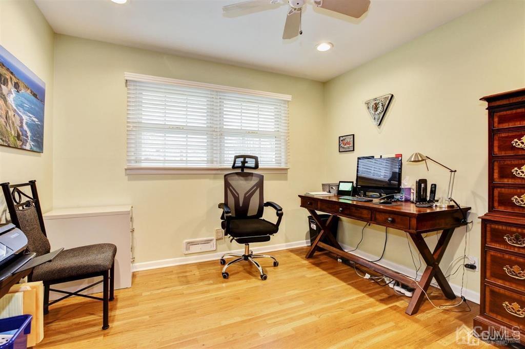 6 Huntington Road Edison, NJ 08820 - Photo 19 of 23 a view of a workspace with furniture and a window