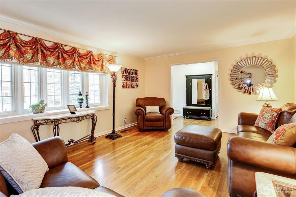 6 Huntington Road Edison, NJ 08820 - Photo 10 of 23 a living room with furniture and a large window
