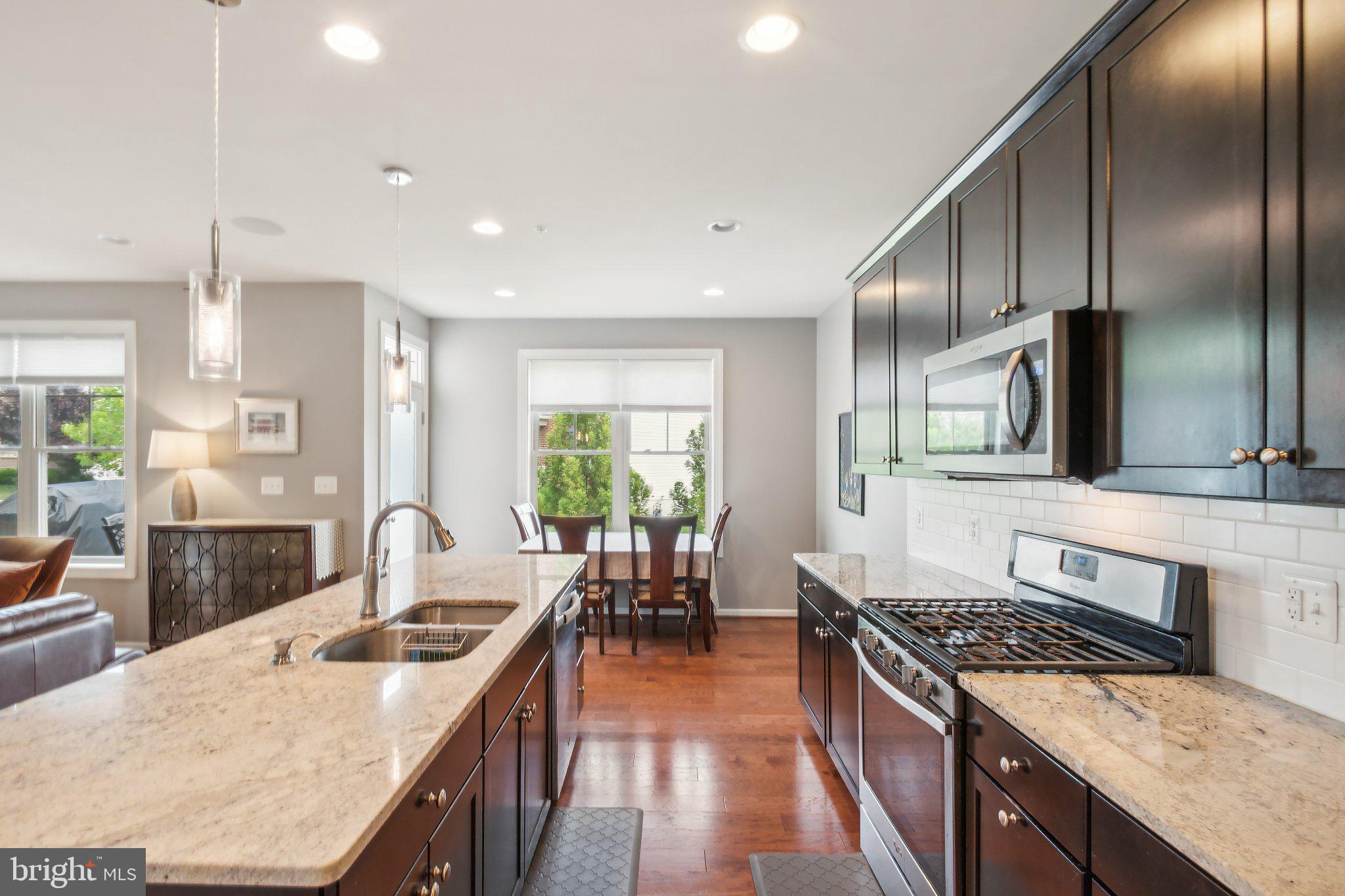 13305 Windy Meadow Lane Silver Spring, MD 20906 - Photo 6 of 25 Modern kitchen with elegant finishes.