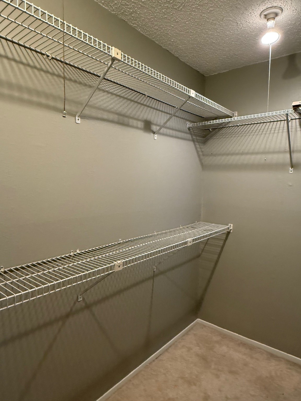7112 North Holiday Drive, Unit 7112 Galveston, TX 77550 - Photo 17 of 19 a view of a room with racks on the wall