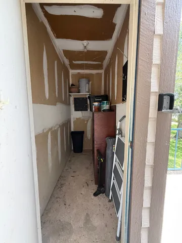 a view of storage and utility room