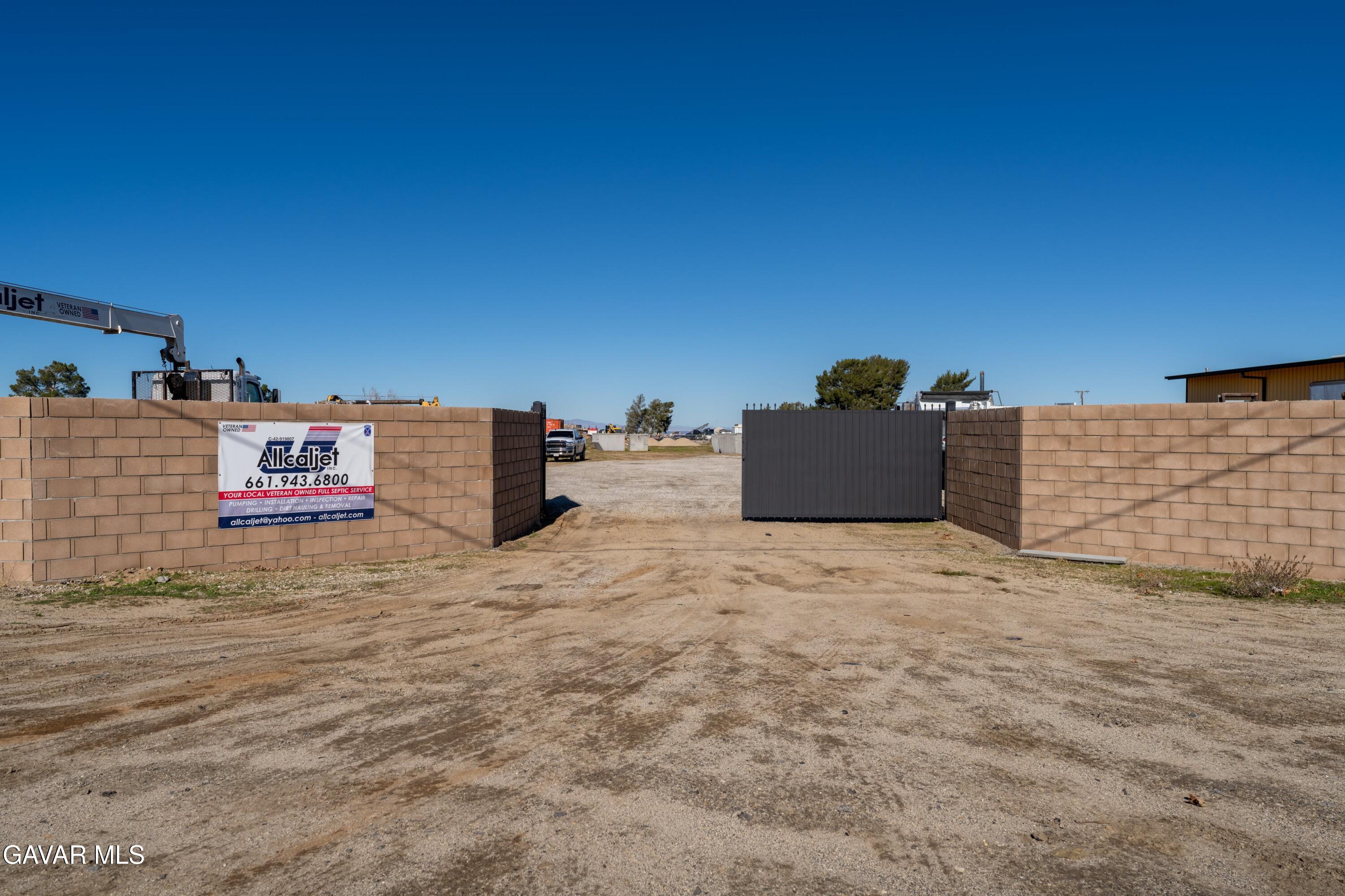 Columbia Way East Lancaster, CA 93535 - Photo 2 of 12 swimming pool view with a couch