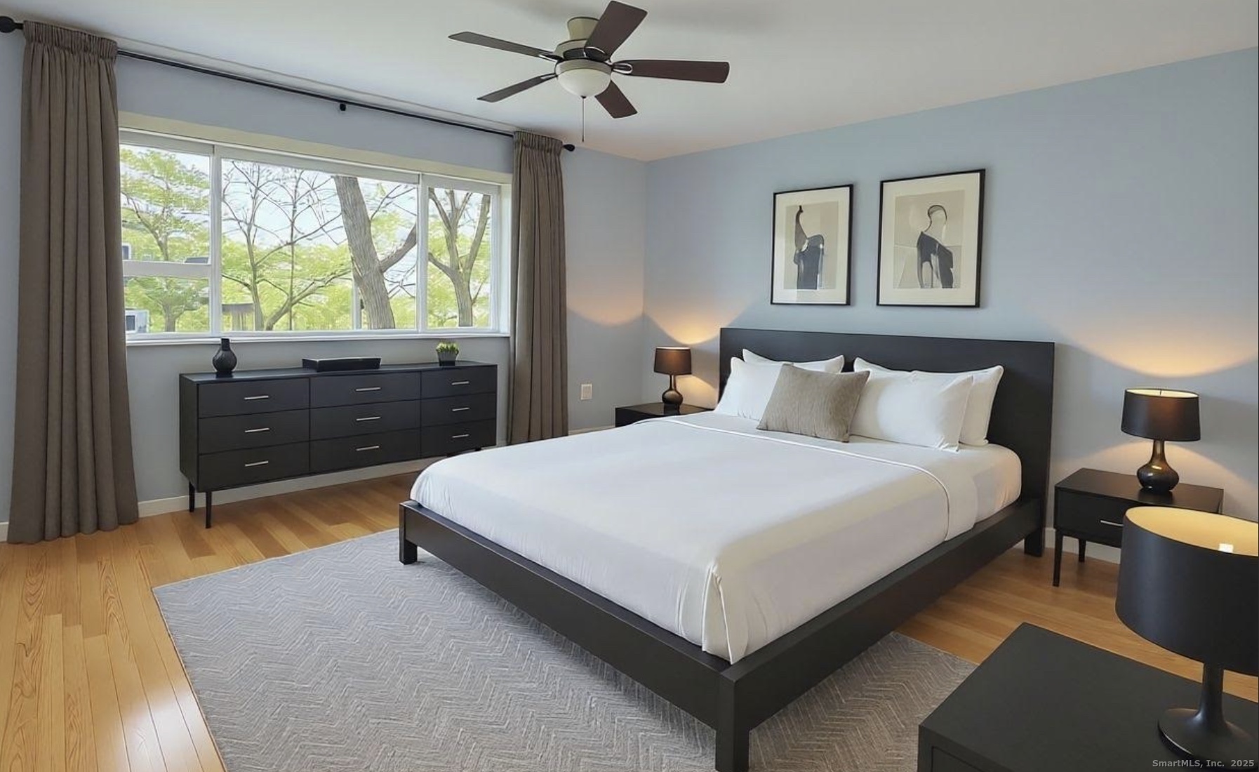 52 Randall Avenue, Unit 8 Stamford, CT 06905 - Photo 9 of 24 a bedroom with a large bed and a window