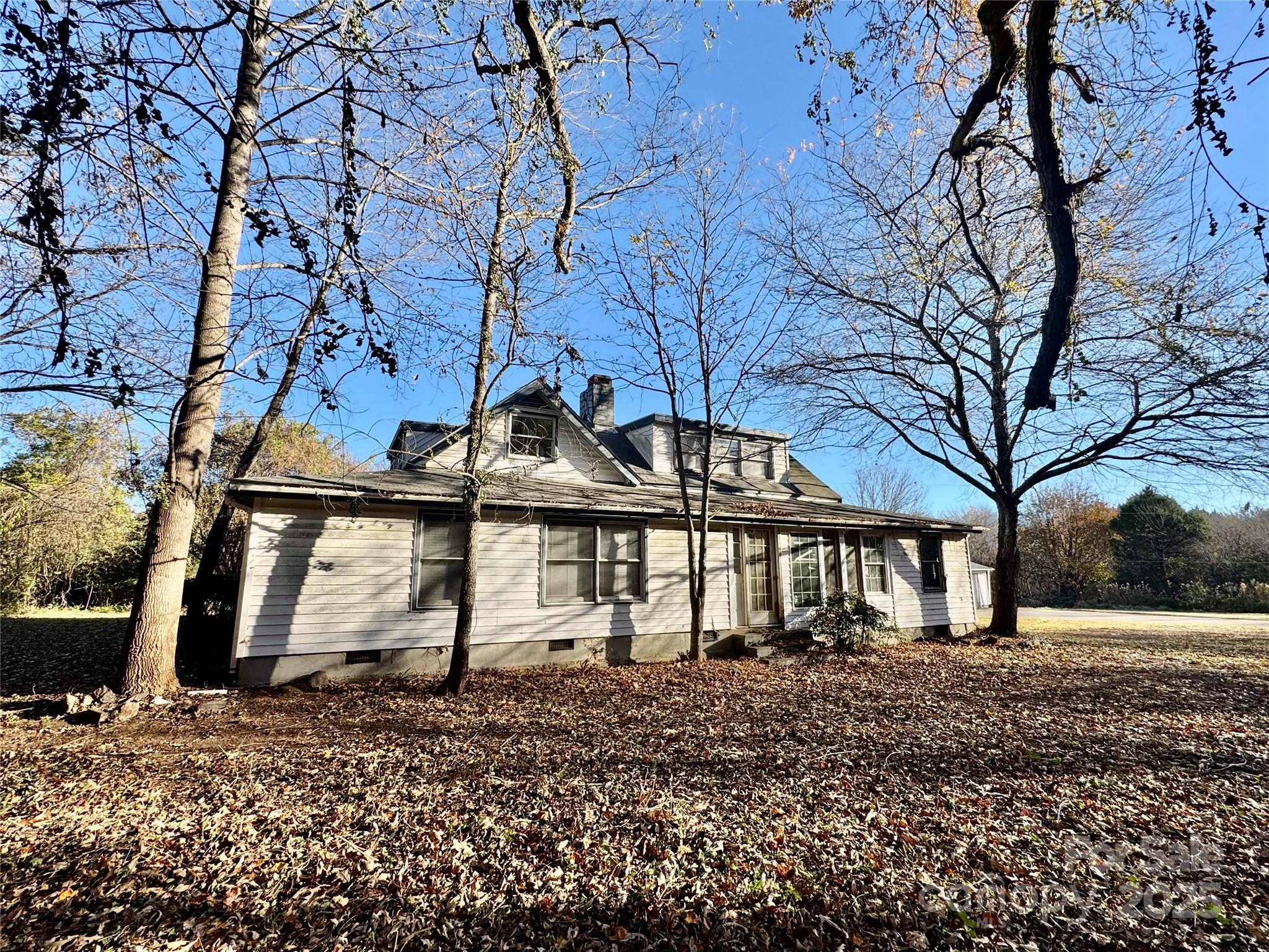 199 Bell Farm Road Statesville, NC 28625 - Photo 12 of 48 a front view of a house with a yard