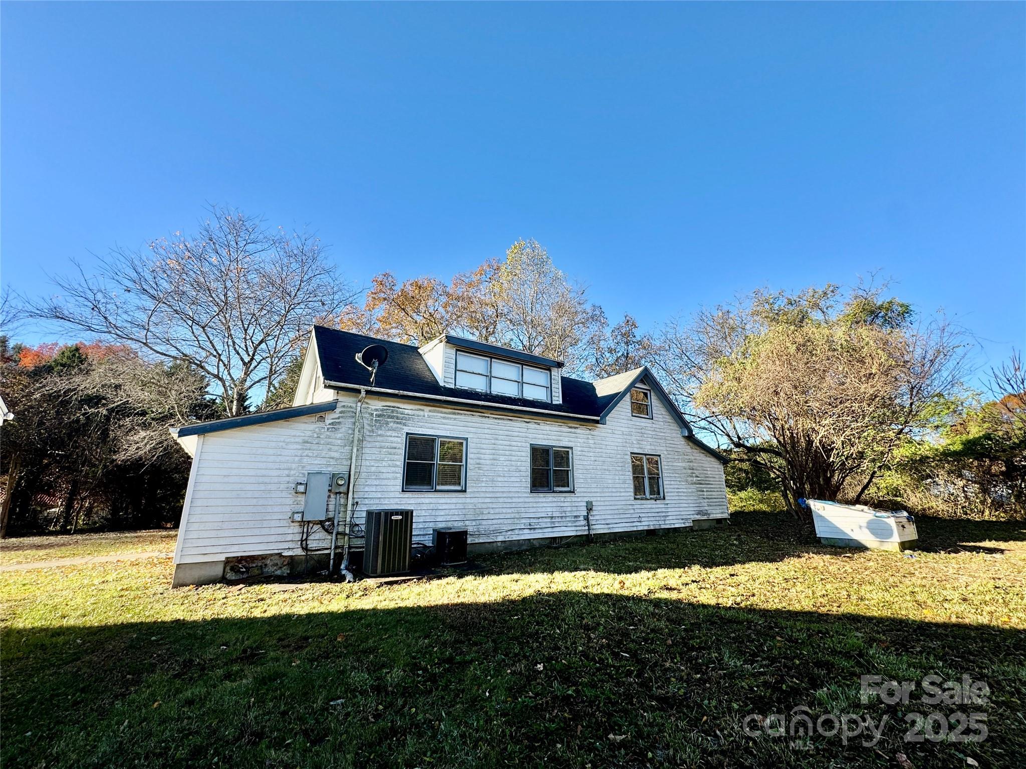 199 Bell Farm Road Statesville, NC 28625 - Photo 14 of 48 a view of a house with backyard and trees