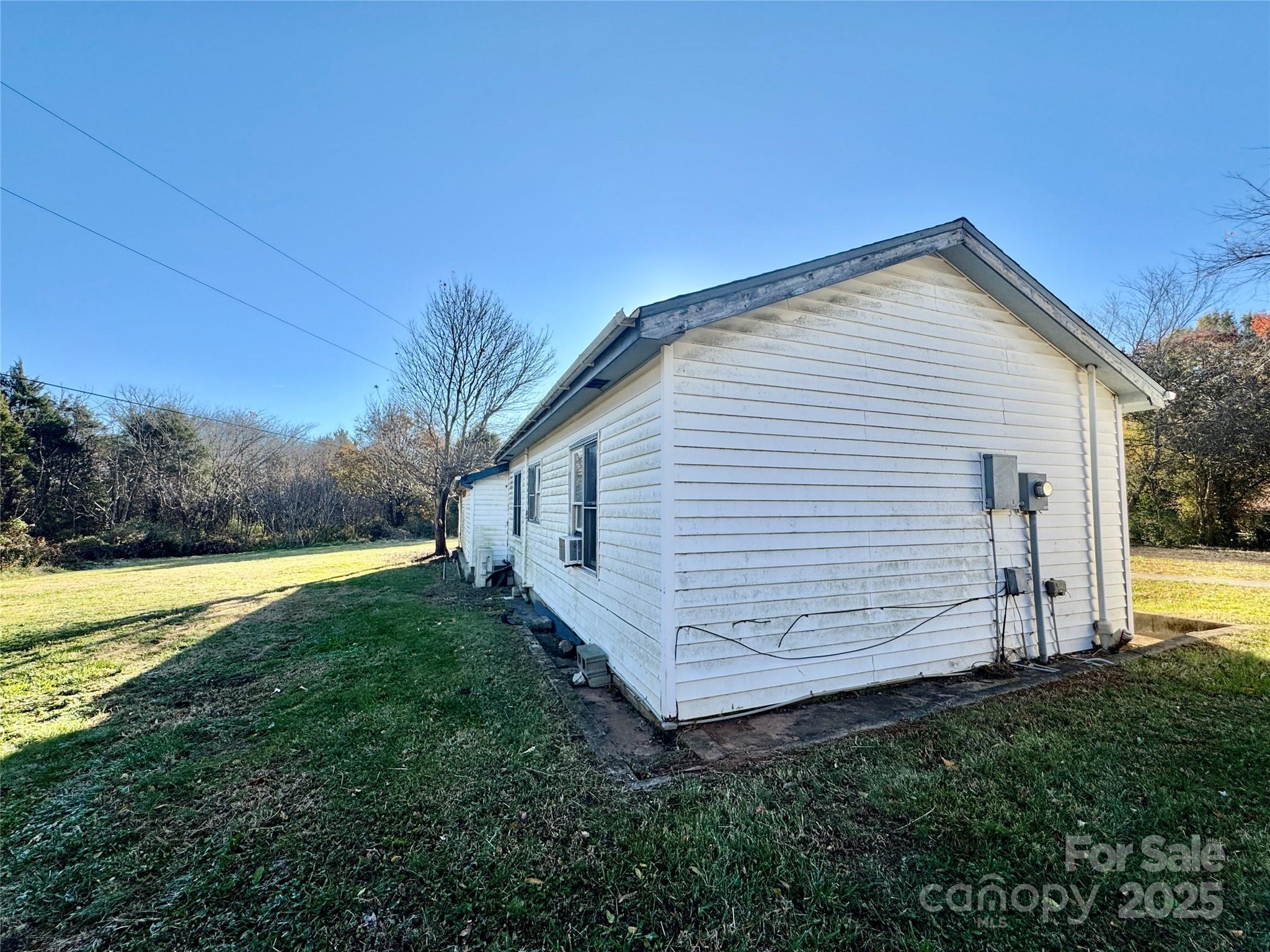 199 Bell Farm Road Statesville, NC 28625 - Photo 15 of 48 a view of a house with backyard