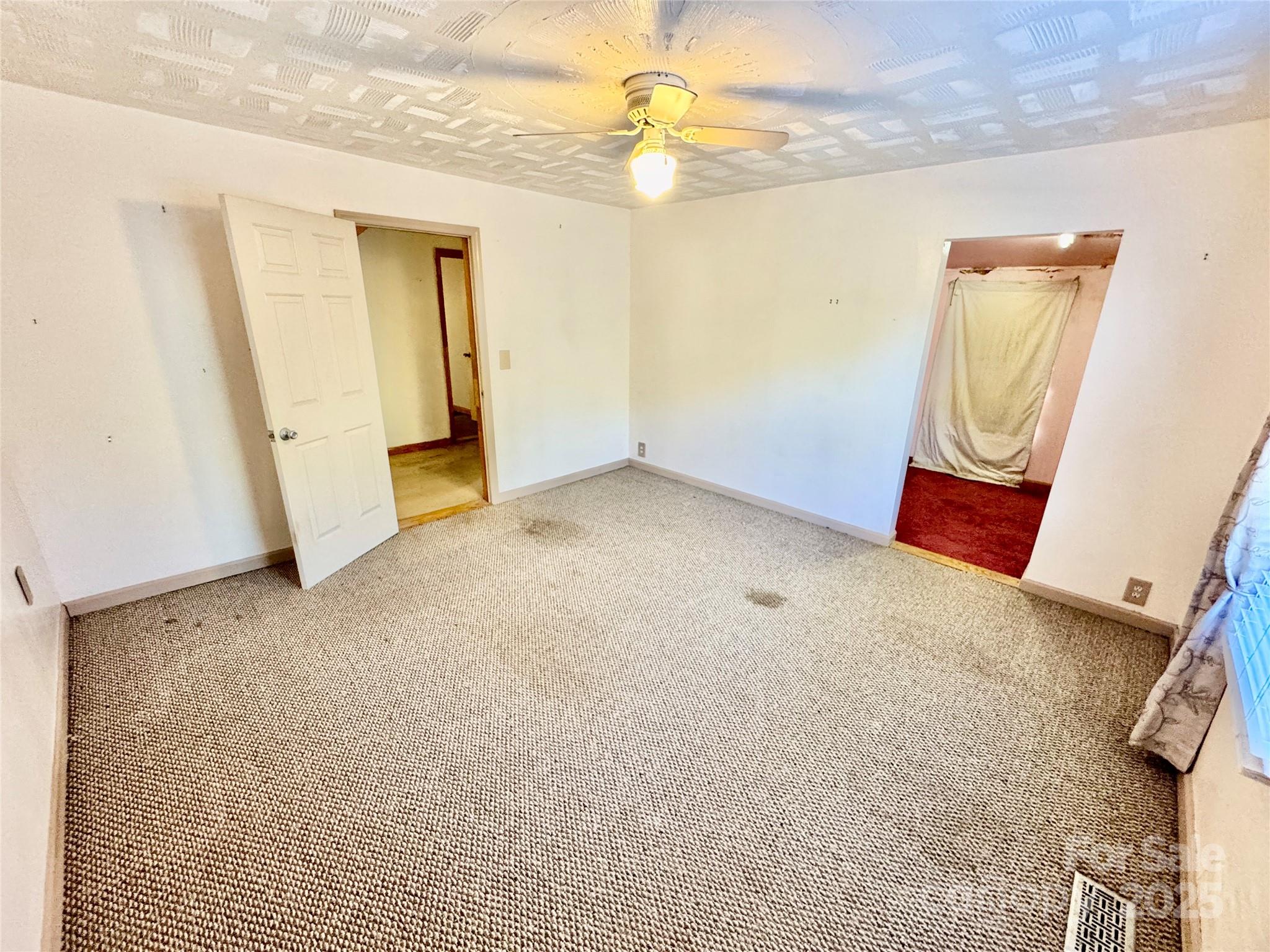 199 Bell Farm Road Statesville, NC 28625 - Photo 25 of 48 an empty room with windows