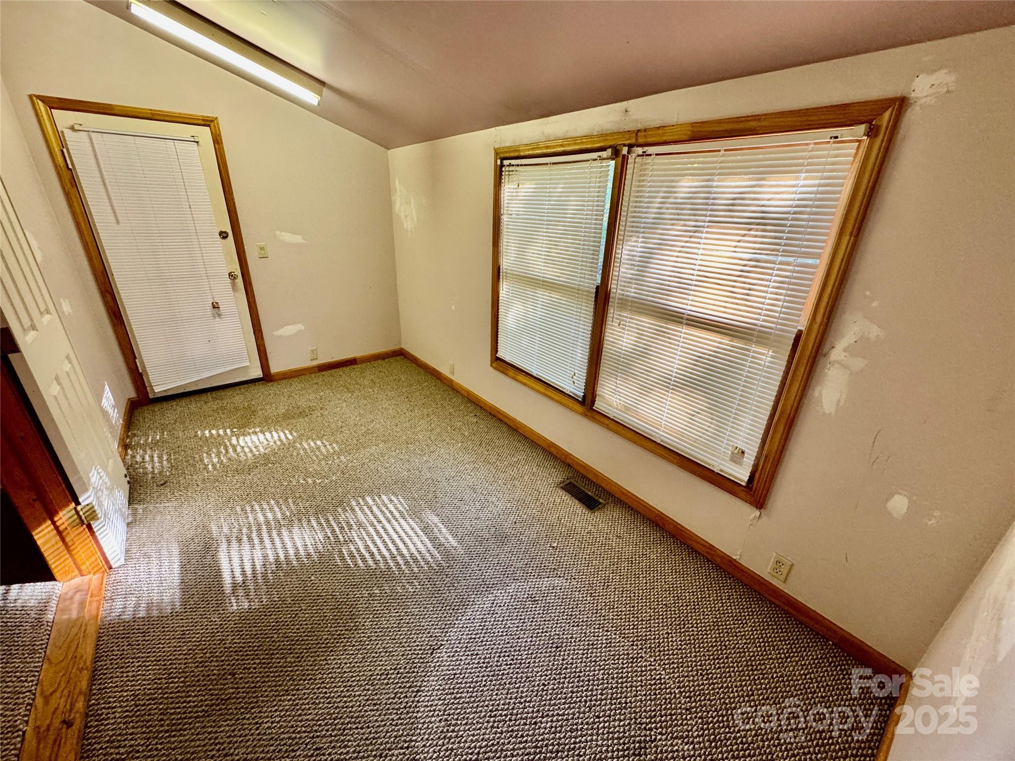 199 Bell Farm Road Statesville, NC 28625 - Photo 32 of 48 a view of a room with door
