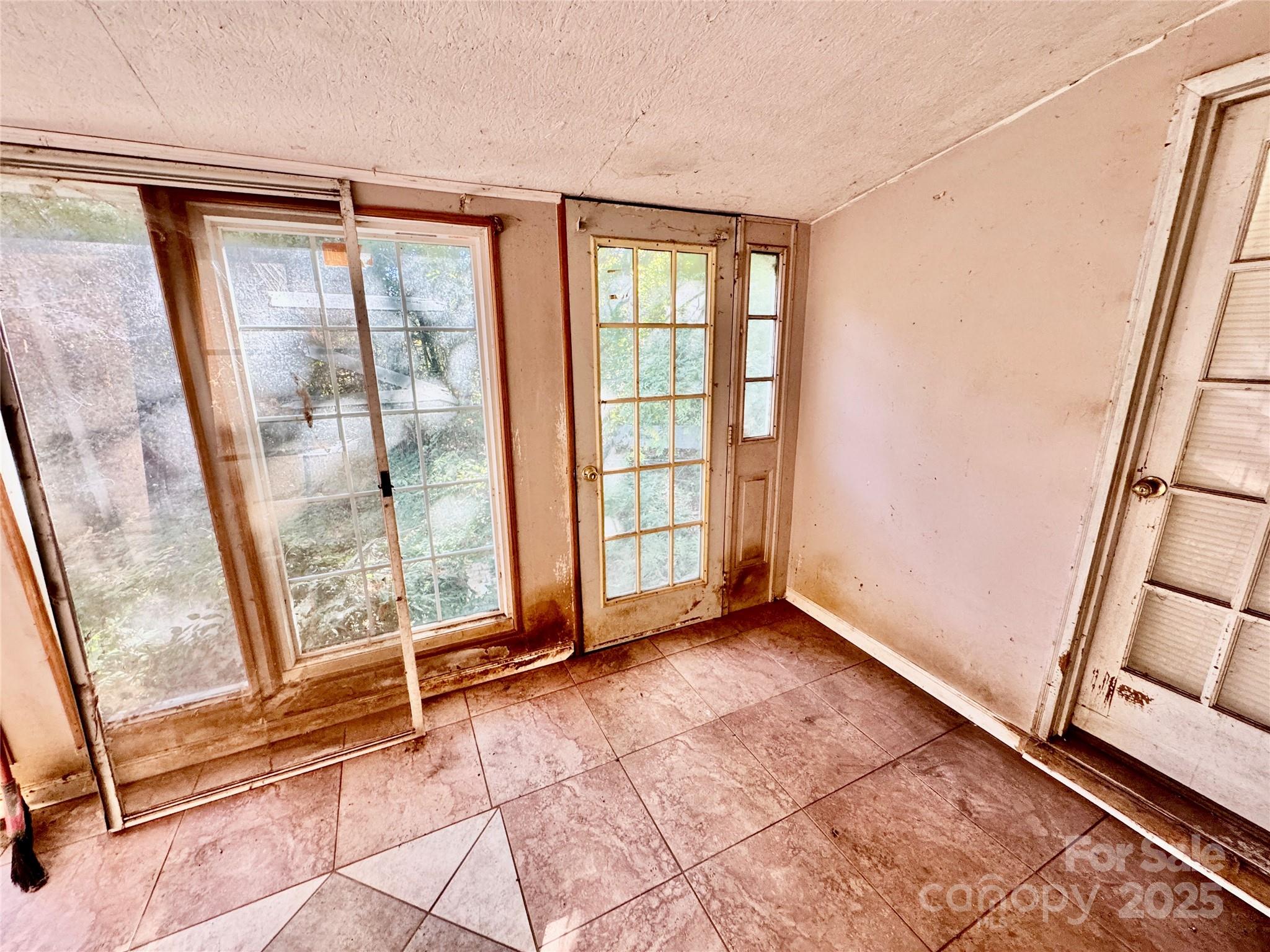 199 Bell Farm Road Statesville, NC 28625 - Photo 35 of 48 a view of an empty room with a window