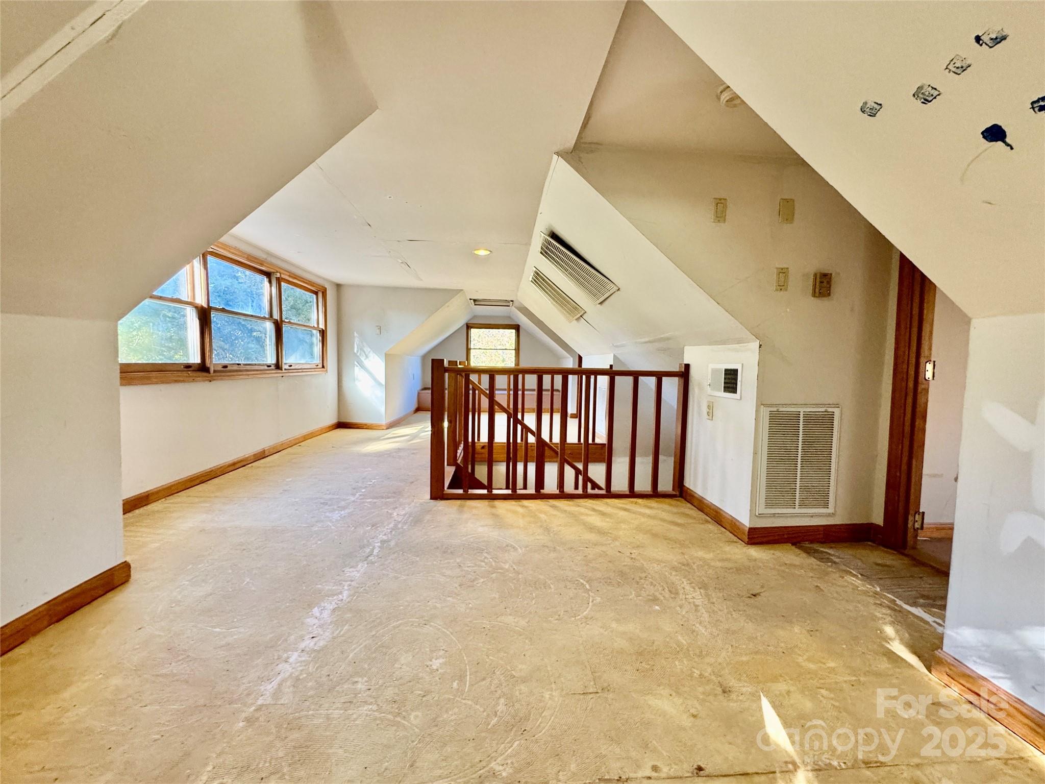 199 Bell Farm Road Statesville, NC 28625 - Photo 40 of 48 a view of an empty room with windows