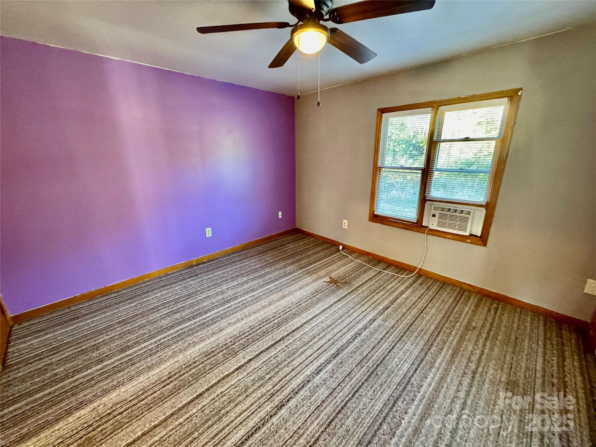 199 Bell Farm Road Statesville, NC 28625 - Photo 44 of 48 wooden floor in an empty room with a window