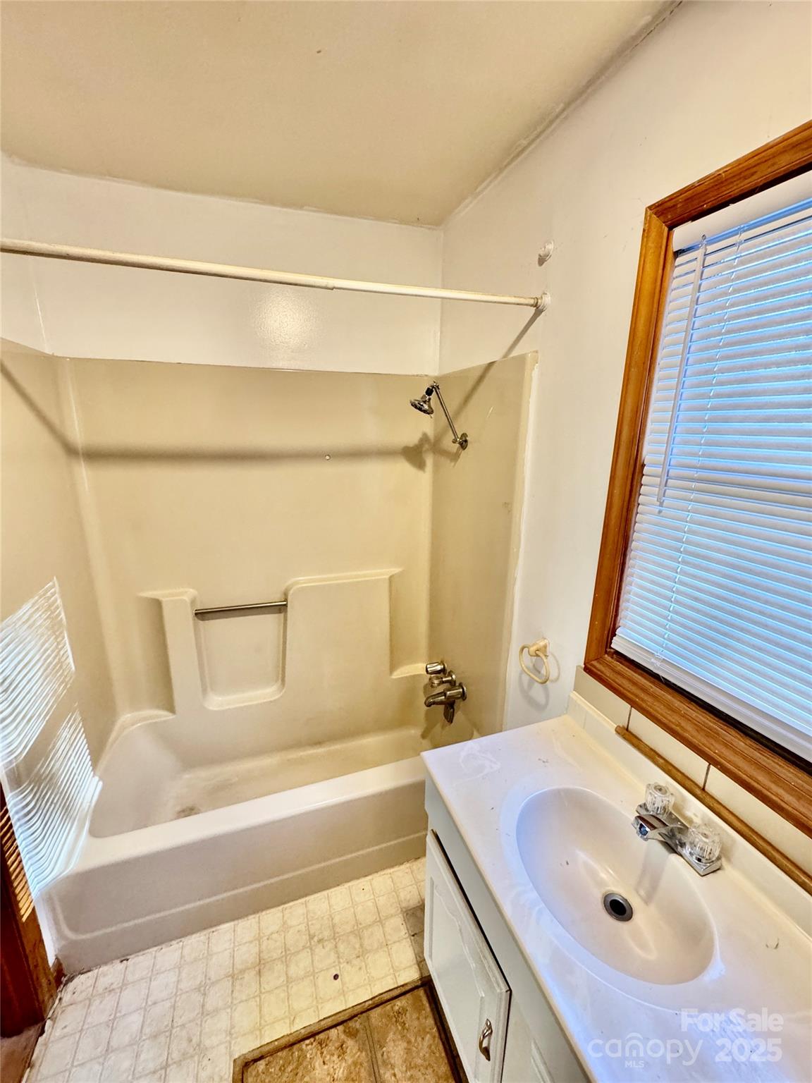199 Bell Farm Road Statesville, NC 28625 - Photo 46 of 48 a bathroom with a sink and a bathtub
