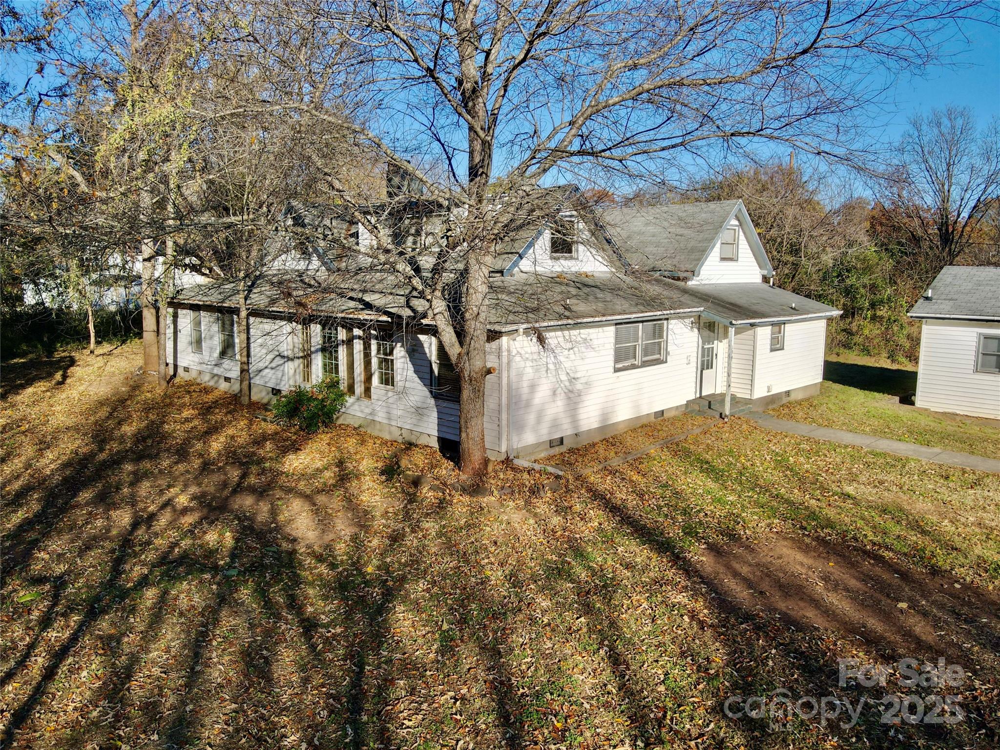 199 Bell Farm Road Statesville, NC 28625 - Photo 5 of 48 a view of a large house with a yard