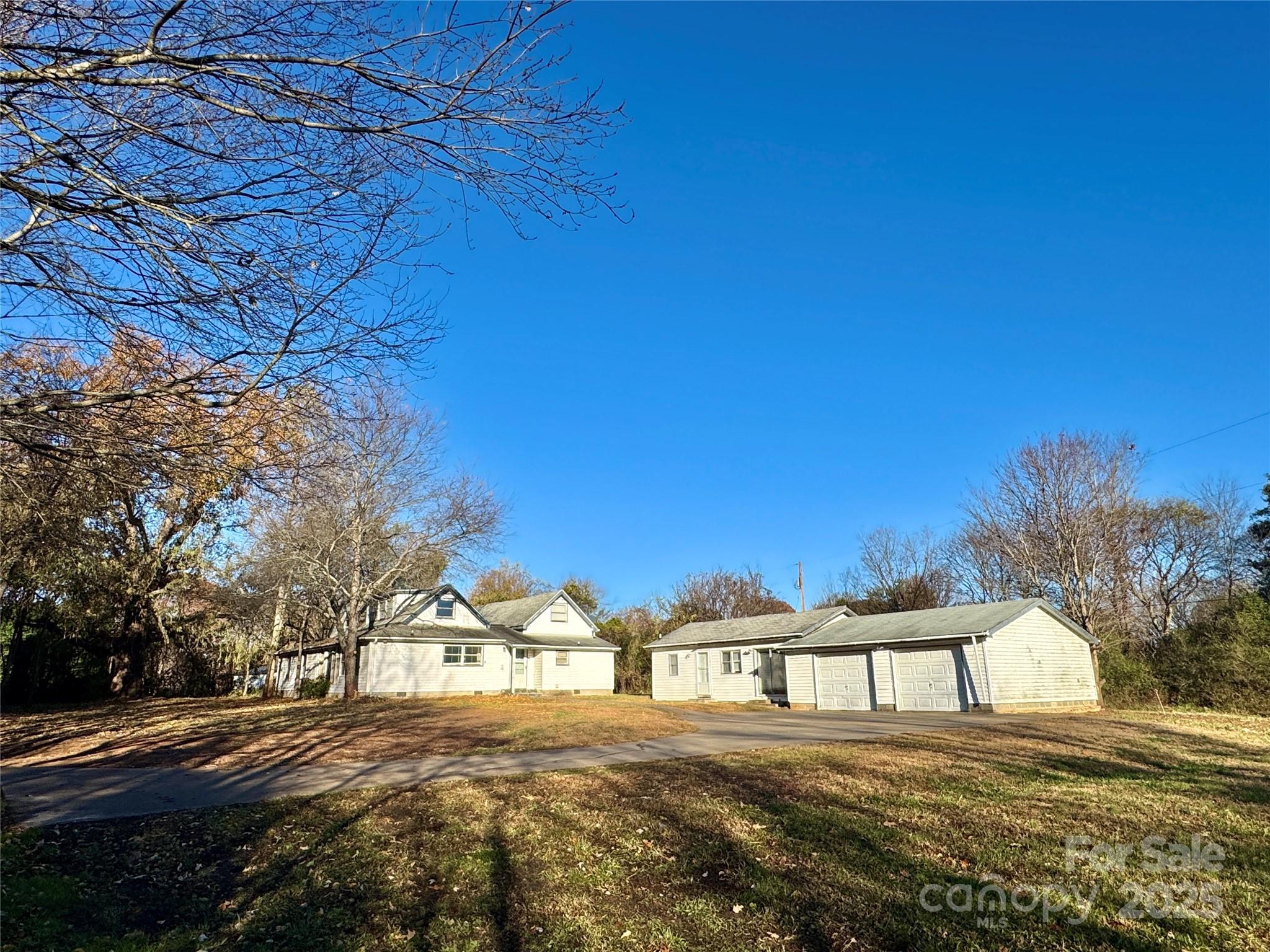 199 Bell Farm Road Statesville, NC 28625 - Photo 6 of 48 a view of a street with a building in the background