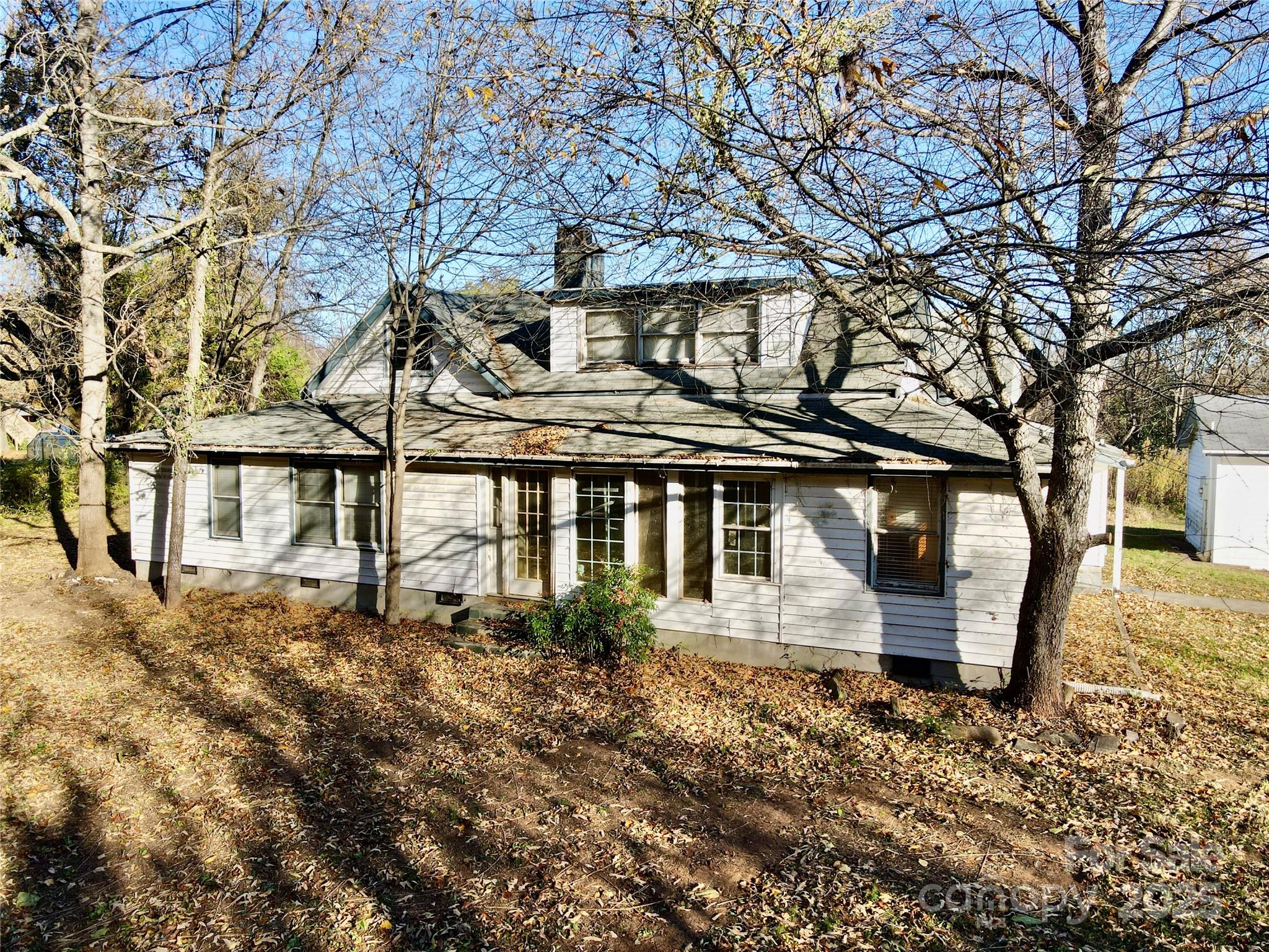199 Bell Farm Road Statesville, NC 28625 - Photo 7 of 48 a front view of a house with a yard