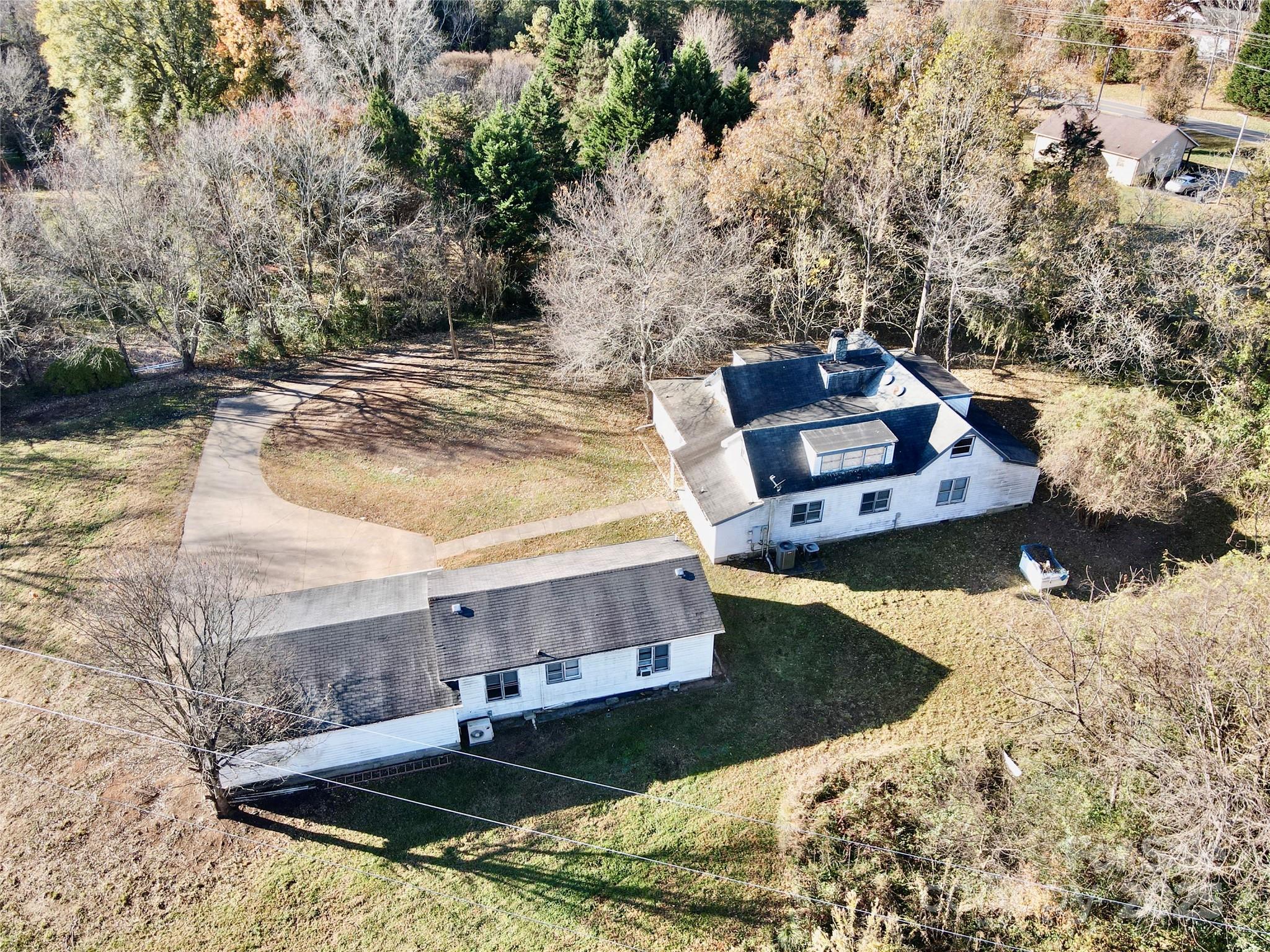 199 Bell Farm Road Statesville, NC 28625 - Photo 9 of 48 a view of a house with yard and snow
