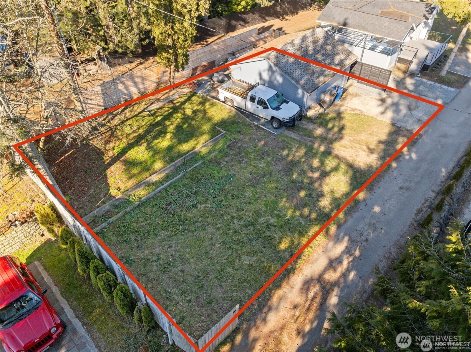 1423 Southwest 158th Street, Unit 2/3 Burien, WA 98166 - Photo 1 of 1 a view of a yard with an outdoor space