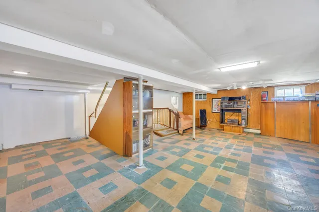 a view of a bedroom with a bed and glass door