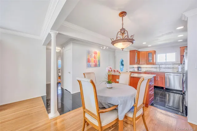 a dining room with furniture and window