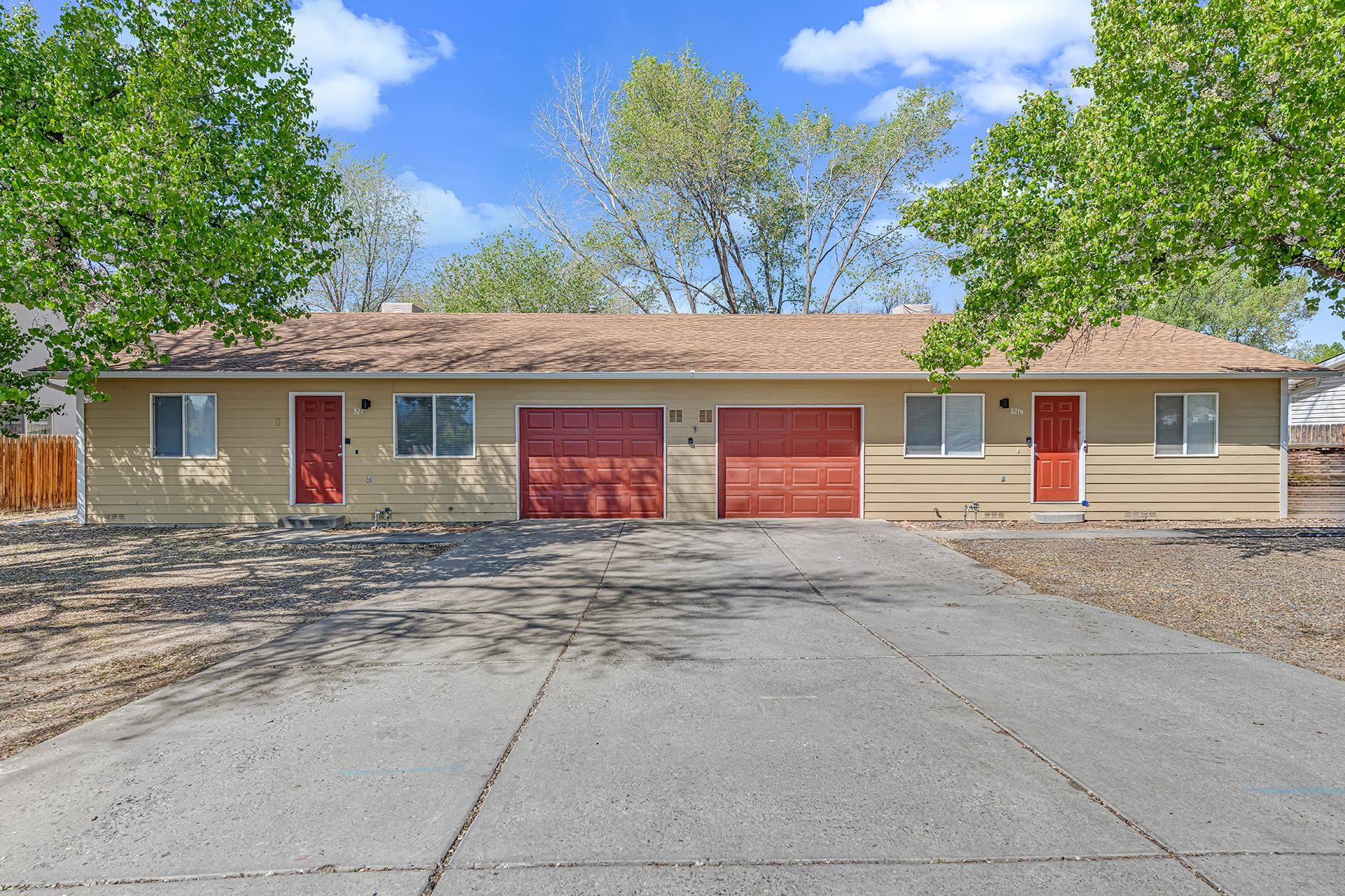 419 1/2 29 1/2 Road Grand Junction, CO 81504 - Photo 1 of 36 a front view of a house with yard
